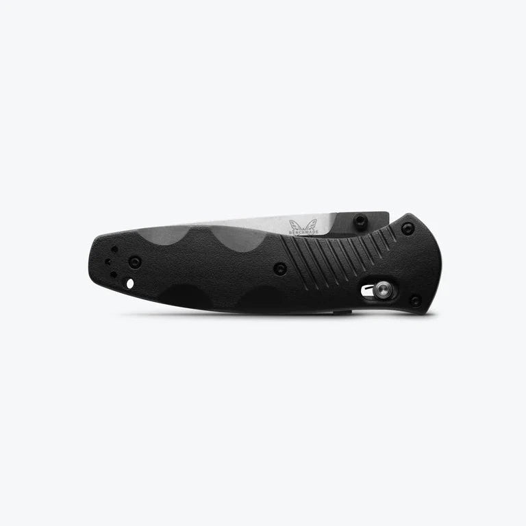 Black folding knife on a white background