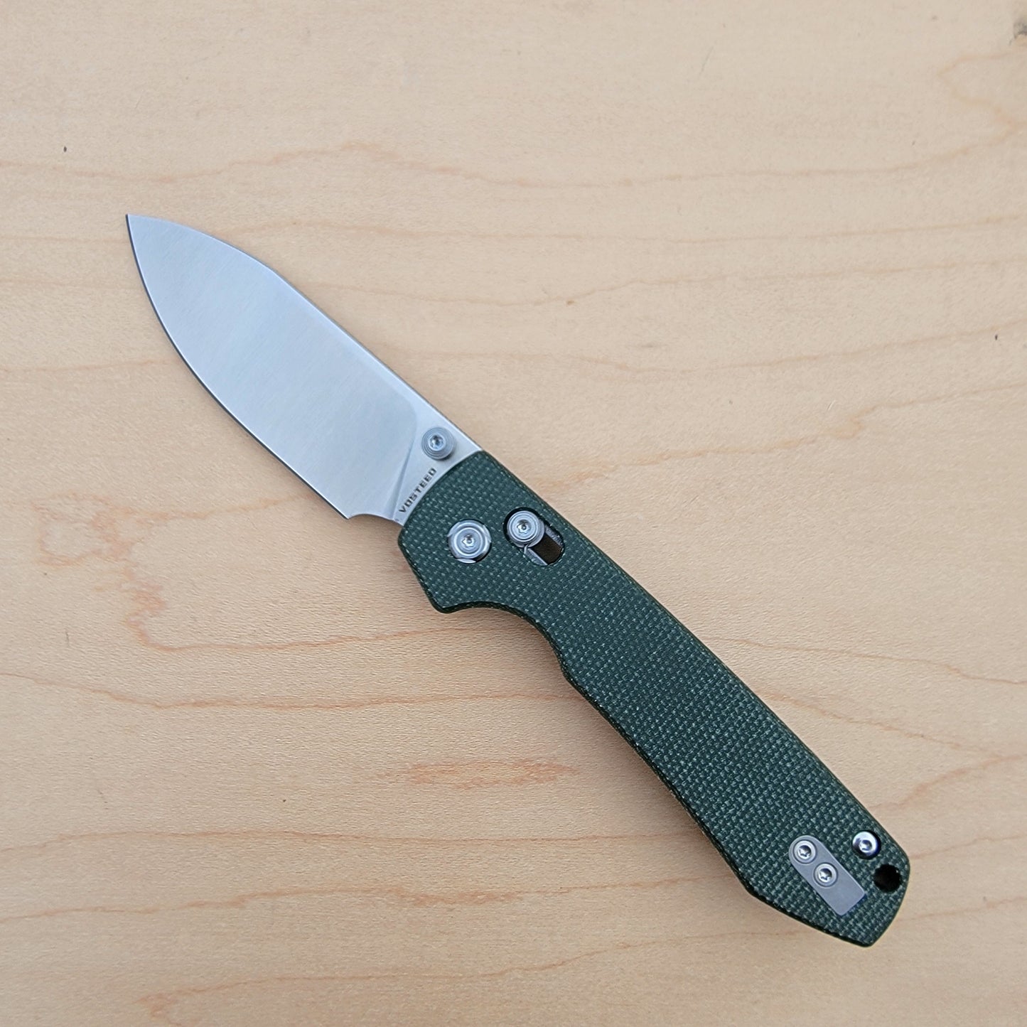 Vosteed Raccoon Crossbar lock - Green Micarta