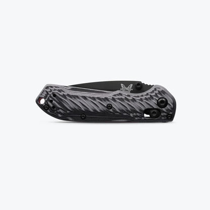Black and gray folding knife on a white background