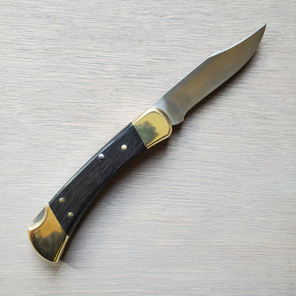 Buck 110 Folding Hunter 3.75" Lockback Ebony Leather Sheath