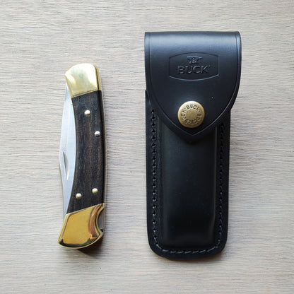 Buck 110 Folding Hunter 3.75" Lockback Ebony Leather Sheath