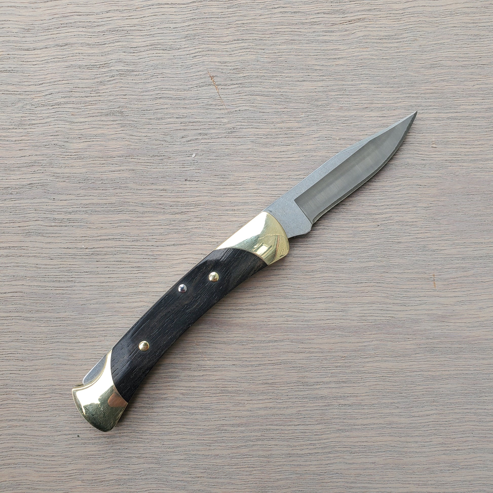 Buck 110 Folding Hunter 3.75 Lockback Ebony Leather Sheath – Uptown Cutlery