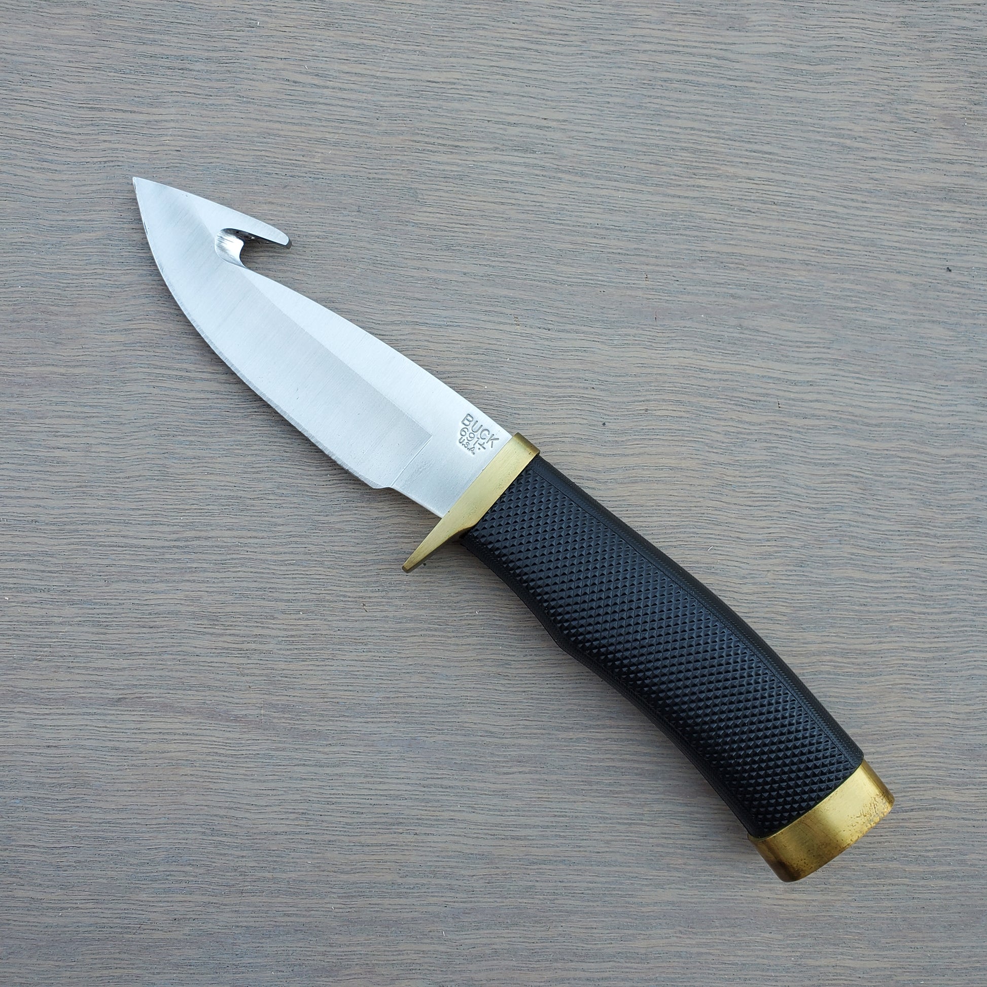 Buck 691 Zipper Skinning Knife Guthook - Rubber Handle – Uptown Cutlery