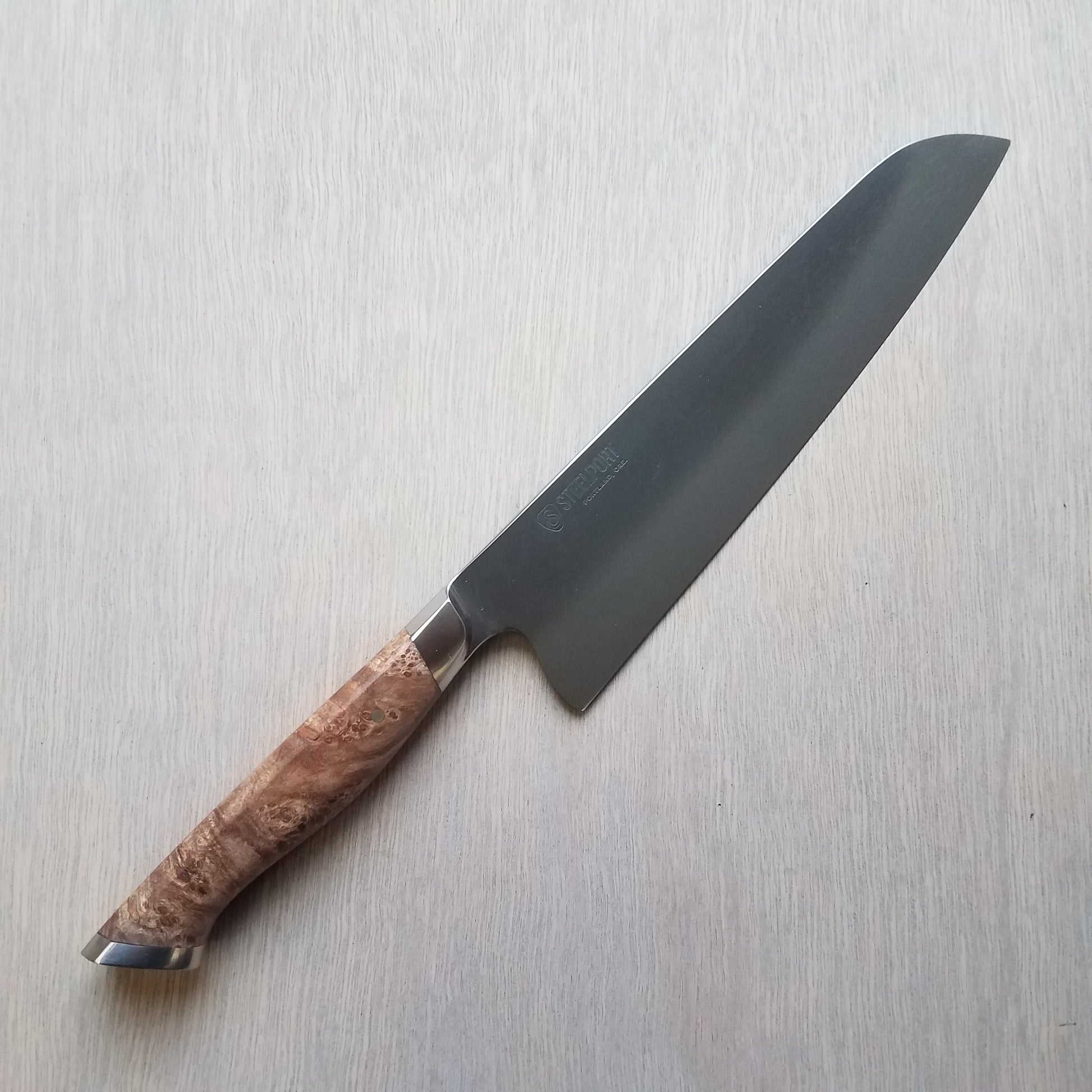 https://uptowncutlery.com/cdn/shop/products/Steelport_8_Carbon_Chef_Knife3.jpg?v=1641503875&width=1946